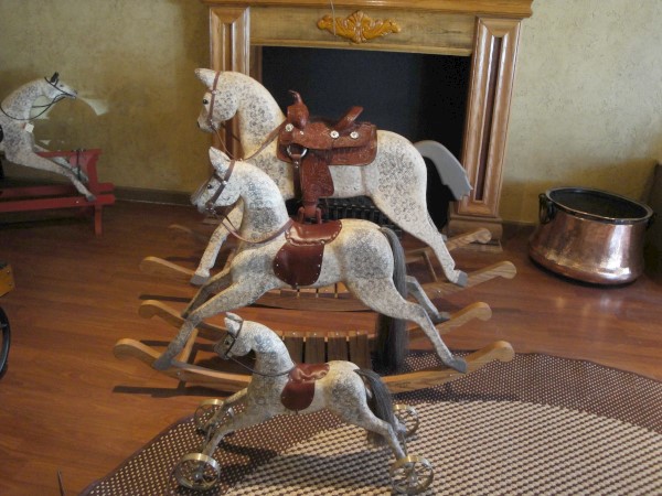 Home decor and decorations: wooden rocking horses.  Comes in 3 sizes.